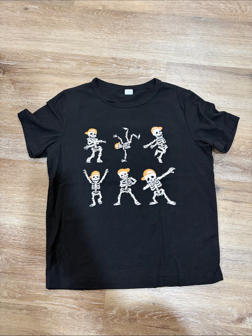 SHEIN Black Tee with Dancing Skeletons and Orange Hats